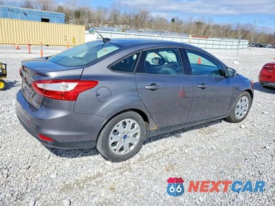 Trzecie zdjęcie samochodu z tyłu: 2012 FORD FOCUS SE VIN:1FAHP3F28CL381551 - miniatura