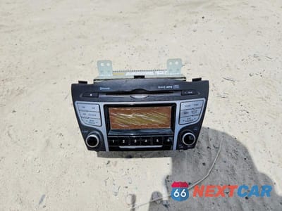 Zdjęcie 13 z 14 samochodu: 2012 HYUNDAI TUCSON GLS VIN:KM8JU3AC7CU443449 - miniatura