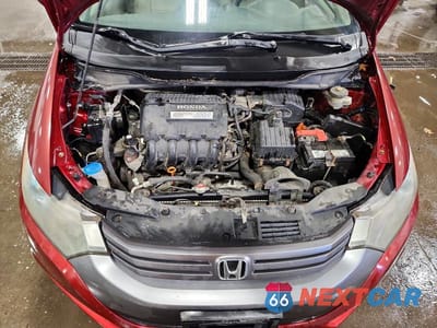 Zdjęcie 12 z 13 samochodu: 2010 HONDA INSIGHT EX VIN:JHMZE2H75AS016849 - miniatura