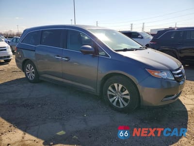 Czwarte zdjęcie samochodu z boku: 2014 HONDA ODYSSEY EXL VIN:5FNRL5H6XEB026098 - miniatura