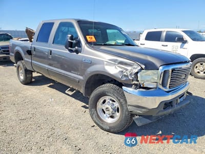 Czwarte zdjęcie samochodu z boku: 2002 FORD F350 SRW SUPER DUTY VIN:1FTSW31F62EA54954 - miniatura