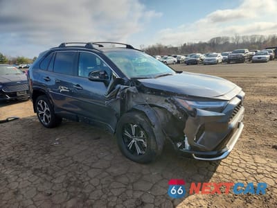 Czwarte zdjęcie samochodu z boku: 2023 TOYOTA RAV4 PRIME XSE VIN:JTMEB3FV1PD140209 - miniatura