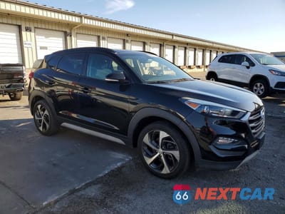 Czwarte zdjęcie samochodu z boku: 2018 HYUNDAI TUCSON VALUE VIN:KM8J3CA20JU736505 - miniatura