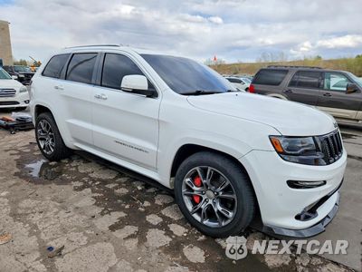 Czwarte zdjęcie samochodu z boku: 2014 JEEP GRAND CHEROKEE SRT-8 VIN:1C4RJFDJ8EC571641 - miniatura