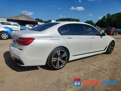 Trzecie zdjęcie samochodu z tyłu: 2019 BMW 740 I VIN:WBA7E2C5XKB217238 - miniatura