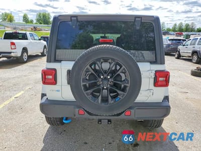 Zdjęcie 6 z 13 samochodu: 2023 JEEP WRANGLER SAHARA 4XE VIN:1C4JJXP62PW583439 - miniatura