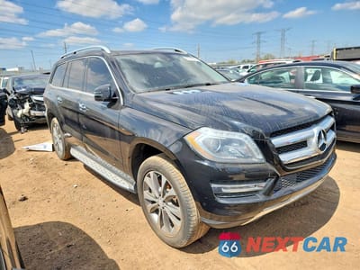 Czwarte zdjęcie samochodu z boku: 2014 MERCEDES-BENZ GL 450 4MATIC VIN:4JGDF7CE5EA308911 - miniatura