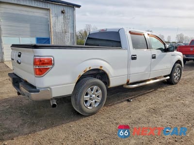 Trzecie zdjęcie samochodu z tyłu: 2014 FORD F150 SUPERCREW VIN:1FTFW1ET4EFC02751 - miniatura