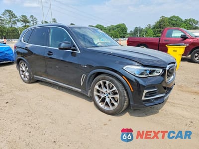 Czwarte zdjęcie samochodu z boku: 2023 BMW X5 XDRIVE45E VIN:5UXTA6C05P9R81021 - miniatura