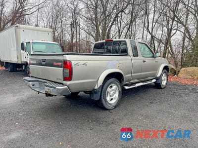 Czwarte zdjęcie samochodu z boku: 2000 NISSAN FRONTIER XE-V6 VIN:1N6ED26Y6YC364207 - miniatura