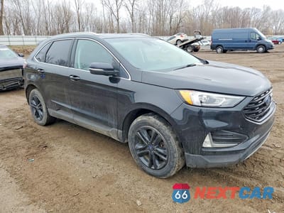 Czwarte zdjęcie samochodu z boku: 2019 FORD EDGE SEL VIN:2FMPK4J94KBB21088 - miniatura