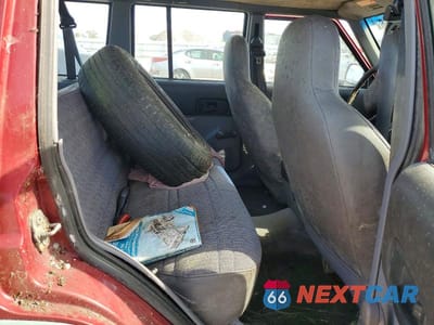 Zdjęcie 10 z 12 samochodu: 1998 JEEP CHEROKEE SE VIN:1J4FJ28S9WL133995 - miniatura