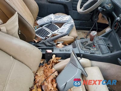 Zdjęcie 12 z 13 samochodu: 1990 BMW 3 SERIES VIN:WBABB1303J8271235 - miniatura