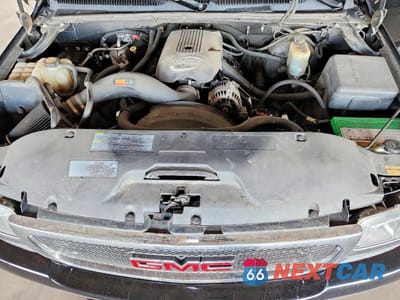 Zdjęcie 11 z 12 samochodu: 2002 GMC NEW SIERRA K1500 VIN:1GTEK14T22Z111058 - miniatura