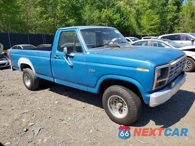 Czwarte zdjęcie samochodu z boku: 1985 FORD F150 VIN:1FTEF14Y2FNA60920 - miniatura