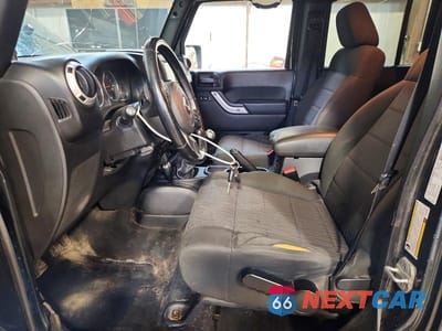Zdjęcie 7 z 13 samochodu: 2011 JEEP WRANGLER UNLIMITED SAHARA VIN:1J4BA5H16BL620752 - miniatura