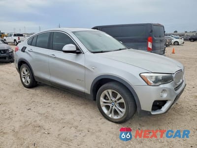Czwarte zdjęcie samochodu z boku: 2015 BMW X4 XDRIVE28I VIN:5UXXW3C55F0M88911 - miniatura