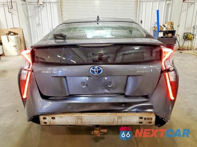 Zdjęcie 6 z 13 samochodu: 2017 TOYOTA PRIUS THREE VIN:JTDKARFU4H3046655 - miniatura