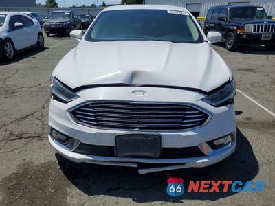 Piąte zdjęcie samochodu w środku: 2017 FORD FUSION SE HYBRID VIN:3FA6P0LU8HR165395 - miniatura