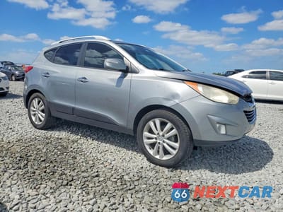 Czwarte zdjęcie samochodu z boku: 2010 HYUNDAI TUCSON LIMITED VIN:KM8JU3AC5AU079822 - miniatura