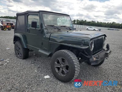 Czwarte zdjęcie samochodu z boku: 1997 JEEP WRANGLER / TJ SAHARA VIN:1J4FY49S7VP505024 - miniatura