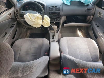 Zdjęcie 8 z 12 samochodu: 2001 TOYOTA COROLLA LE VIN:2T1BR12E51C486342 - miniatura