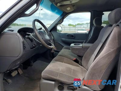 Zdjęcie 7 z 12 samochodu: 2002 FORD F150 VIN:1FTRX18W62NA55852 - miniatura
