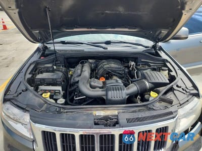Zdjęcie 12 z 13 samochodu: 2012 JEEP GRAND CHEROKEE LAREDO VIN:1C4RJFAGXCC332839 - miniatura