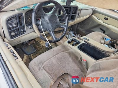 Zdjęcie 8 z 12 samochodu: 2002 CHEVROLET TAHOE C1500 VIN:1GNEC13V62J340235 - miniatura