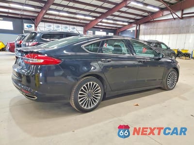 Trzecie zdjęcie samochodu z tyłu: 2018 FORD FUSION SE VIN:3FA6P0T9XJR118533 - miniatura