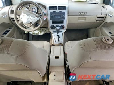 Zdjęcie 8 z 14 samochodu: 2009 DODGE CALIBER SXT VIN:1B3HB48A29D198427 - miniatura