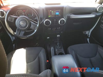 Zdjęcie 8 z 12 samochodu: 2016 JEEP WRANGLER UNLIMITED SAHARA VIN:1C4BJWEG7GL144264 - miniatura
