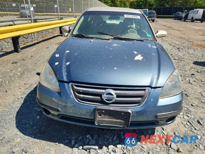 Piąte zdjęcie samochodu w środku: 2006 NISSAN ALTIMA 2.5 VIN:1N4AL11D76C258953 - miniatura