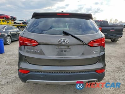 Zdjęcie 6 z 13 samochodu: 2013 HYUNDAI SANTA FE SPORT 2.4L VIN:5XYZUDLB6DG112351 - miniatura