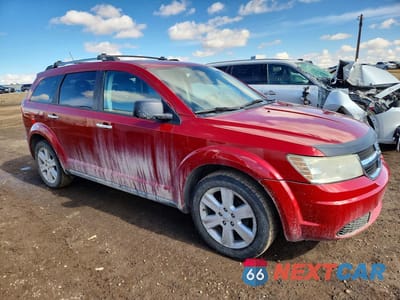 Czwarte zdjęcie samochodu z boku: 2010 DODGE JOURNEY R VIN:3D4PH6FV9AT234948 - miniatura