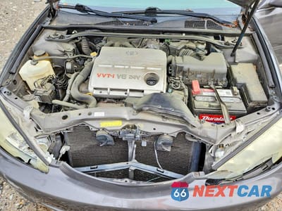 Zdjęcie 11 z 12 samochodu: 2005 TOYOTA CAMRY LE V6 VIN:4T1BF32K45U603245 - miniatura