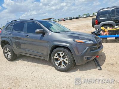 Czwarte zdjęcie samochodu z boku: 2016 JEEP CHEROKEE TRAILHAWK VIN:1C4PJMBS1GW130782 - miniatura