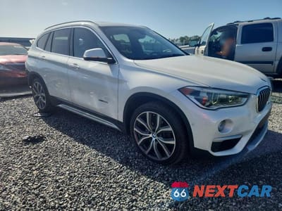 Czwarte zdjęcie samochodu z boku: 2016 BMW X1 XDRIVE28I VIN:WBXHT3C36GP882815 - miniatura