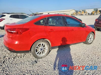 Trzecie zdjęcie samochodu z tyłu: 2017 FORD FOCUS SE VIN:1FADP3F23HL201978 - miniatura