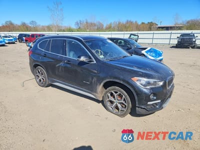 Czwarte zdjęcie samochodu z boku: 2017 BMW X1 XDRIVE28I VIN:WBXHT3C3XH5F76409 - miniatura