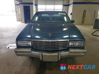 Piąte zdjęcie samochodu w środku: 1992 CADILLAC DEVILLE VIN:1G6CD53B7N4251063 - miniatura