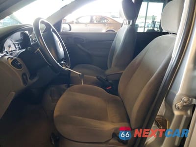 Zdjęcie 7 z 12 samochodu: 2002 FORD FOCUS SE VIN:1FAFP34312W172328 - miniatura