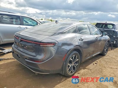 Trzecie zdjęcie samochodu z tyłu: 2023 TOYOTA CROWN XLE VIN:JTDAAAAF2P3014324 - miniatura