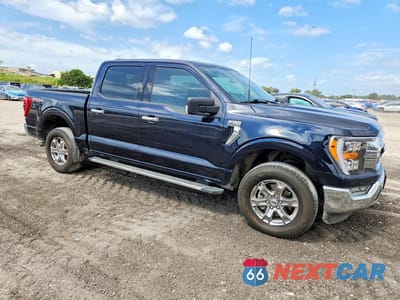 Czwarte zdjęcie samochodu z boku: 2023 FORD F150 SUPERCREW VIN:1FTFW1E84PKF79795 - miniatura