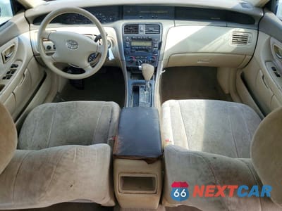 Zdjęcie 8 z 13 samochodu: 2003 TOYOTA AVALON XL VIN:4T1BF28B13U273935 - miniatura