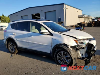 Czwarte zdjęcie samochodu z boku: 2018 TOYOTA RAV4 HYBRID XLE VIN:JTMRJREV4JD175228 - miniatura