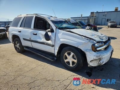 Czwarte zdjęcie samochodu z boku: 2004 CHEVROLET TRAILBLAZER LS VIN:1GNDS13S342267794 - miniatura