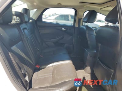 Zdjęcie 10 z 12 samochodu: 2012 FORD FOCUS TITANIUM VIN:1FAHP3J20CL468495 - miniatura