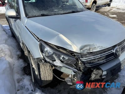 Czwarte zdjęcie samochodu z boku: 2012 VOLKSWAGEN TIGUAN VIN:WVGBV7AX5CW574007 - miniatura