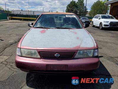 Piąte zdjęcie samochodu w środku: 1995 NISSAN SENTRA BASE VIN:1N4AB41DXSC771192 - miniatura